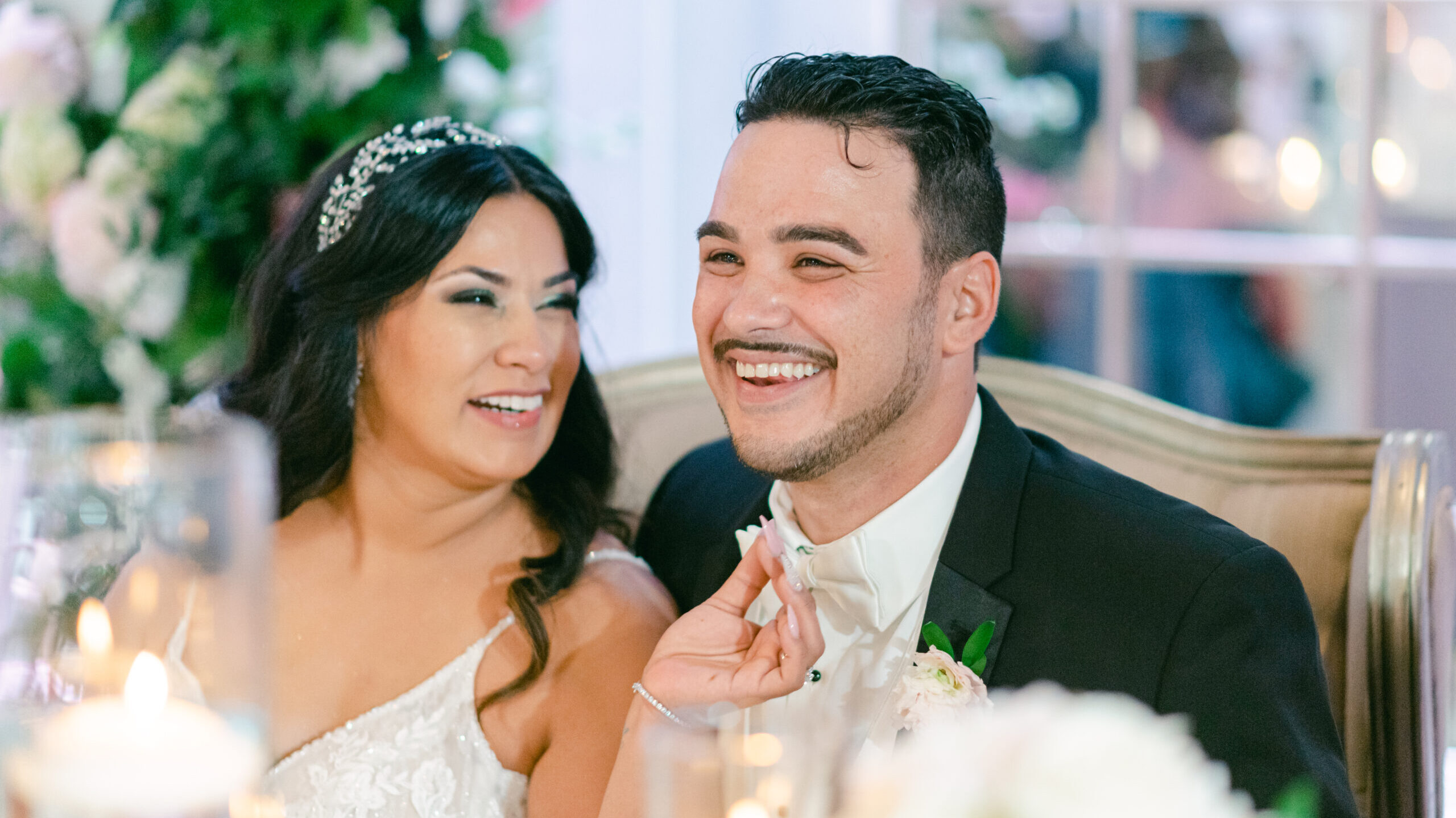 Happy Wedding Couple at The Head Table