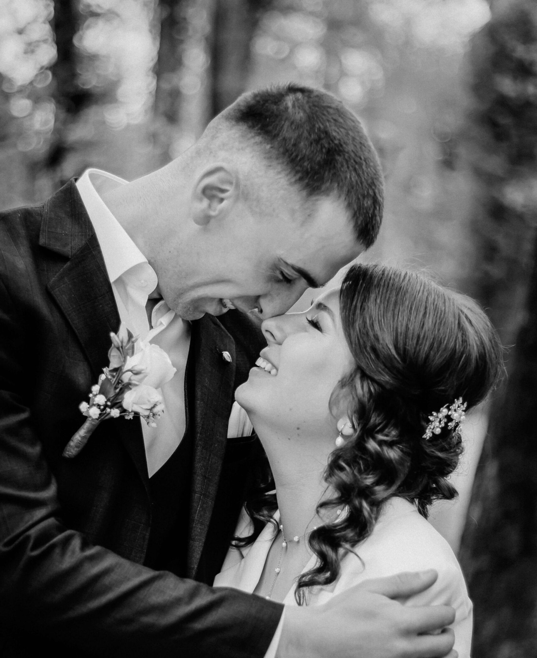 bride and groom eskimo kiss at Nicollet-Island-Pavilion-in-Minneapolis-MN