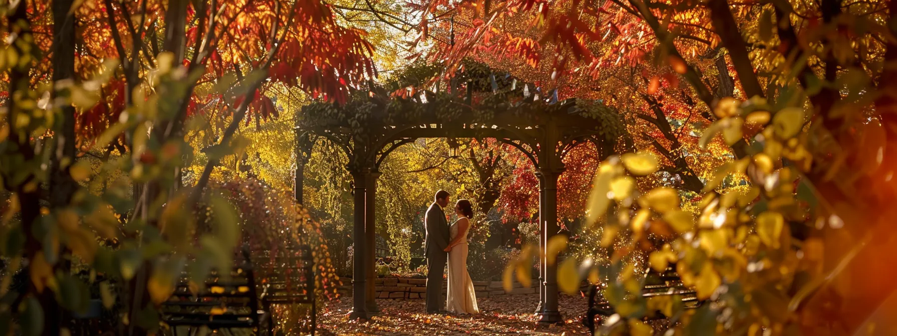 a romantic couple exchanging vows under a canopy of vibrant fall foliage in a charming minneapolis garden.